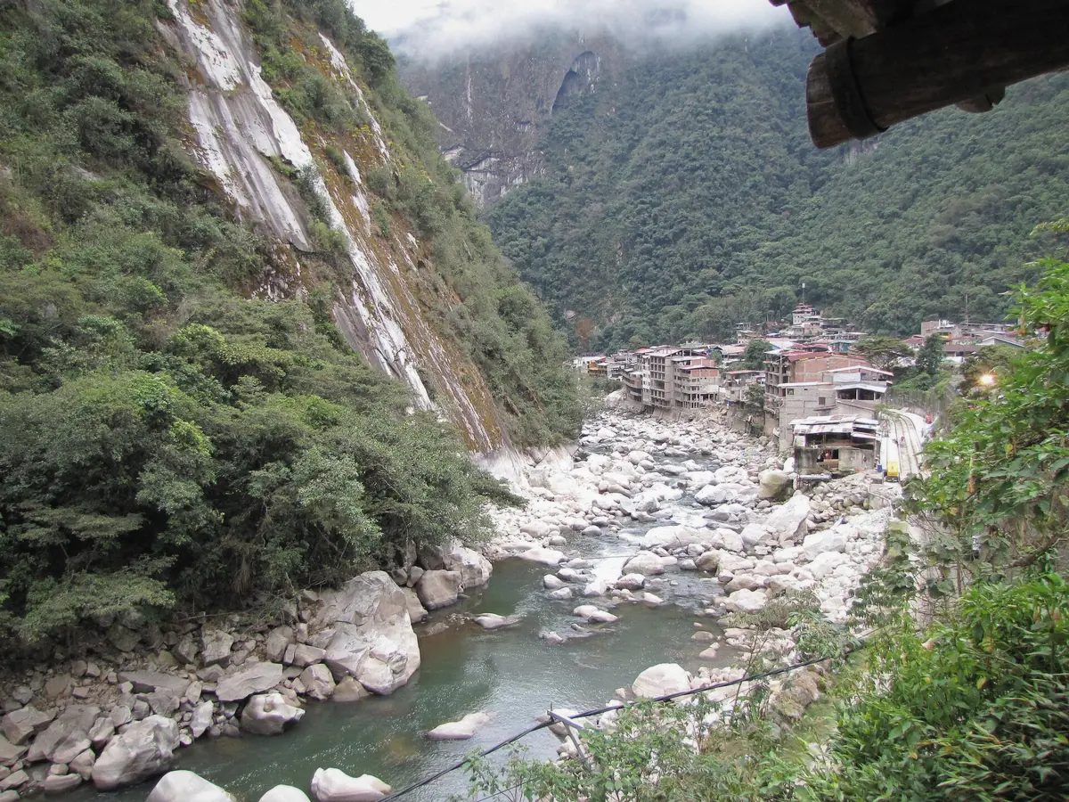The Urubamba river running through Aguas Calientes below the Machu Picchu ridge in Peru