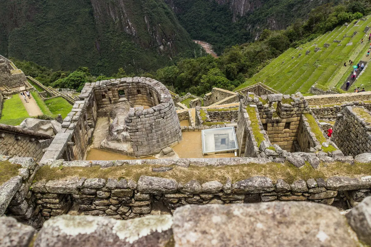 Curved wall of the Temple of the Sun below the Machu Picchu terraces in Peru