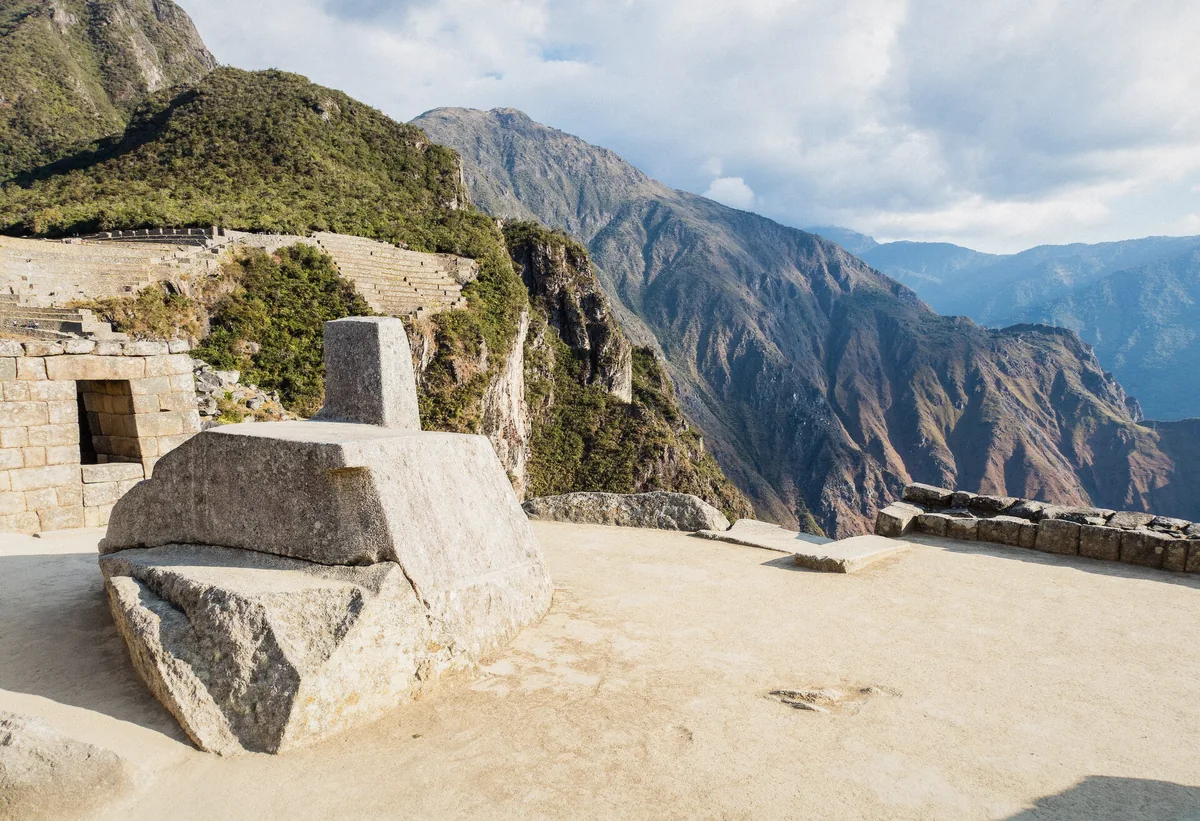 Stone doorway framing the plaza at Machu Picchu citadel in the Cusco Region of Peru