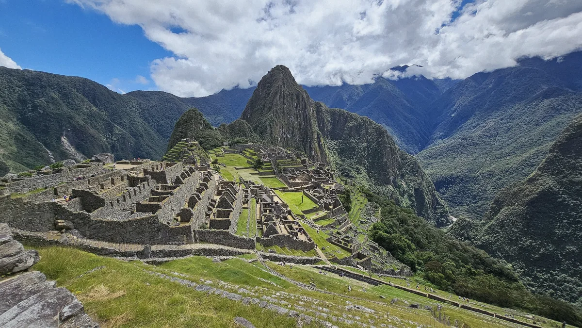 Panoramic view over the Machu Picchu citadel and Huayna Picchu peak on a private tour in Peru