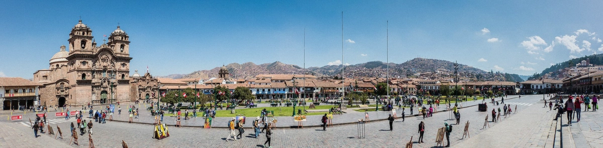 Plaza de Armas in Cusco at dusk with the cathedral lit, Peru