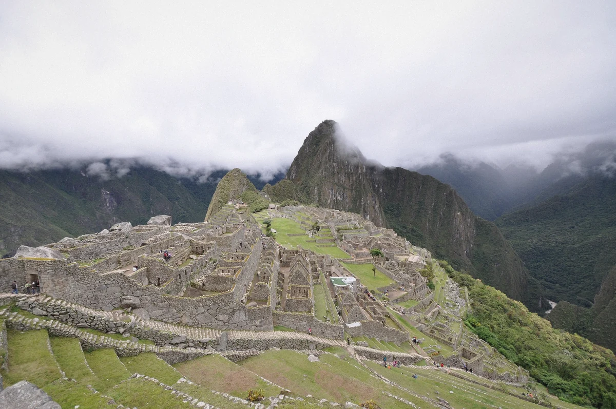 Panorama across the rooftop stones of Machu Picchu citadel in the Cusco Region, Peru
