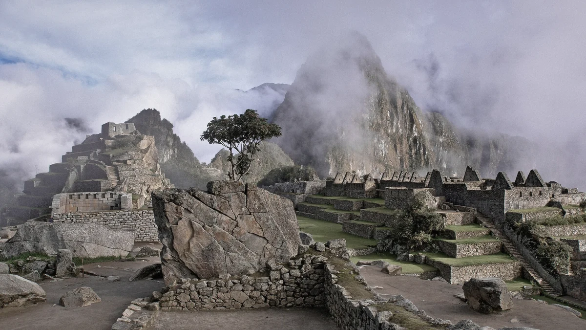 Empty stone walls of Machu Picchu citadel under soft morning light in Peru